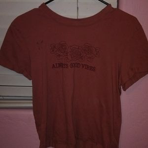 I'm selling an dark orangeish red  t shirt that is size M. Brand is vibe n'